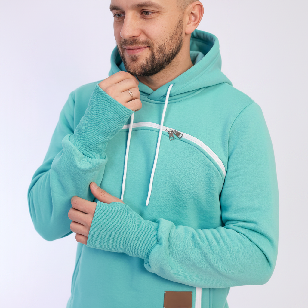 Man wearing a Mint Green hoodie with a brand logo on a white background