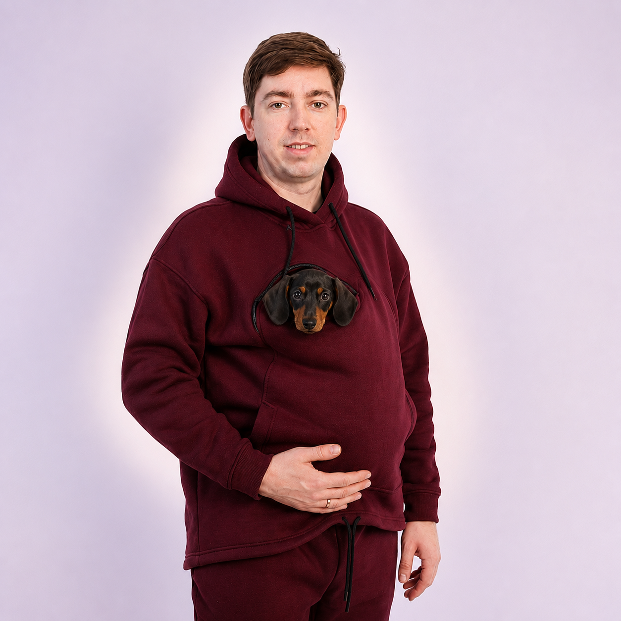 Person wearing a Red Burgundy hoodie with a dachshund face design on a light gray background Main image