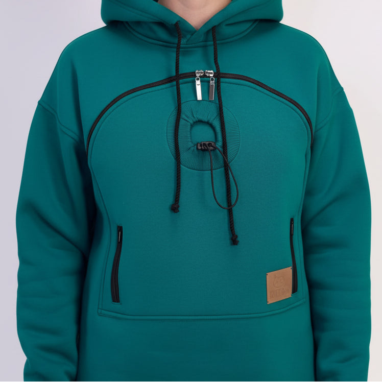 Teal hoodie with black drawstrings and a brown patch on a white background