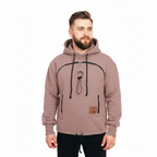 Man wearing a beige hoodie with a brand logo on a white background