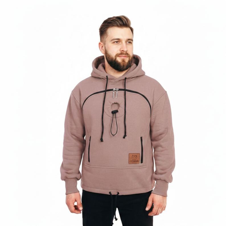 Man wearing a beige hoodie with a brand logo on a white background