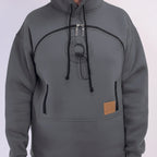 Gray hoodie with black accents and a brown patch on a white background