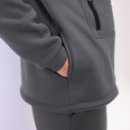 Gray tracksuit with a focus on the hoodie on a light gray background