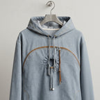 A light blue denim hoodie with a pet pouch and an opening for a pet's head, against a white background.