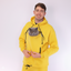 Person wearing a yellow hoodie with a cat face design on a white background